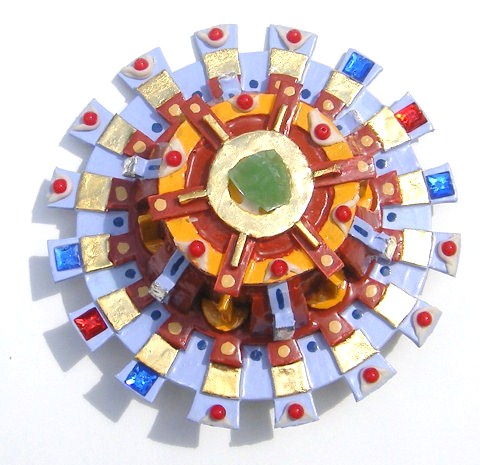 Fibula Castor ( Jade stone )

In the myth the twins shared the same mother but had different fathers which meant that Pollux was immortal and Castor was mortal. When Castor died, Pollux asked Zeus to let him share his own immortality with his twin to keep them together and they were transformed into the Gemini Constellation.